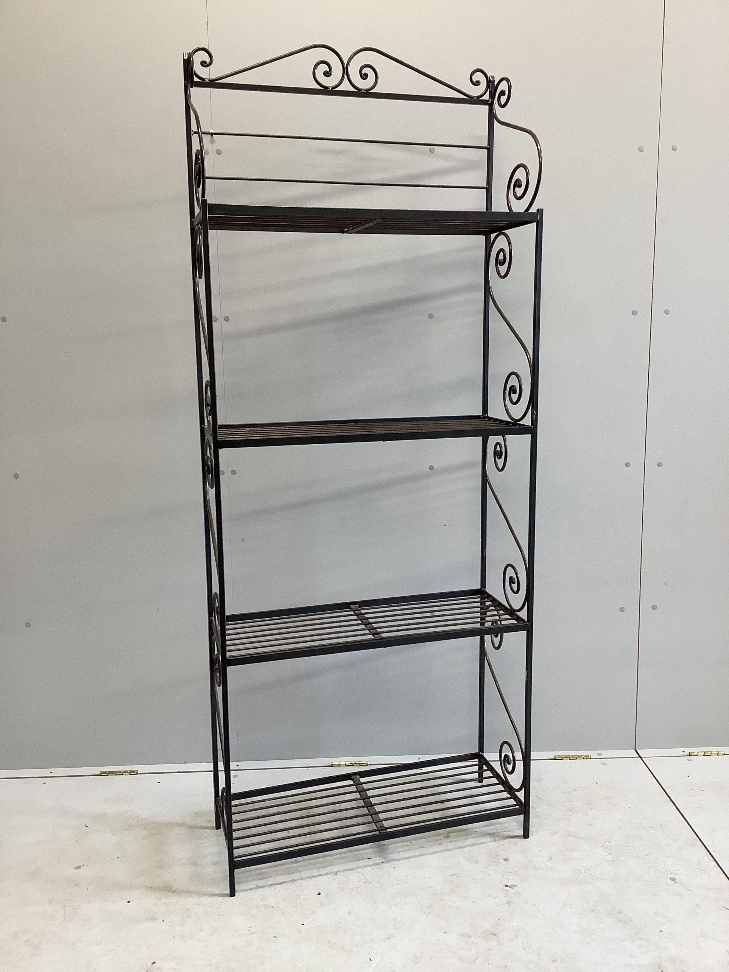 A wrought iron four tier baker's stand, width 76cm, depth 30cm, height 195cm